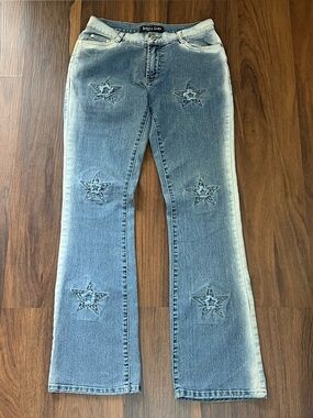 Vintage Y2K Street Code jeans with distressed star patch details